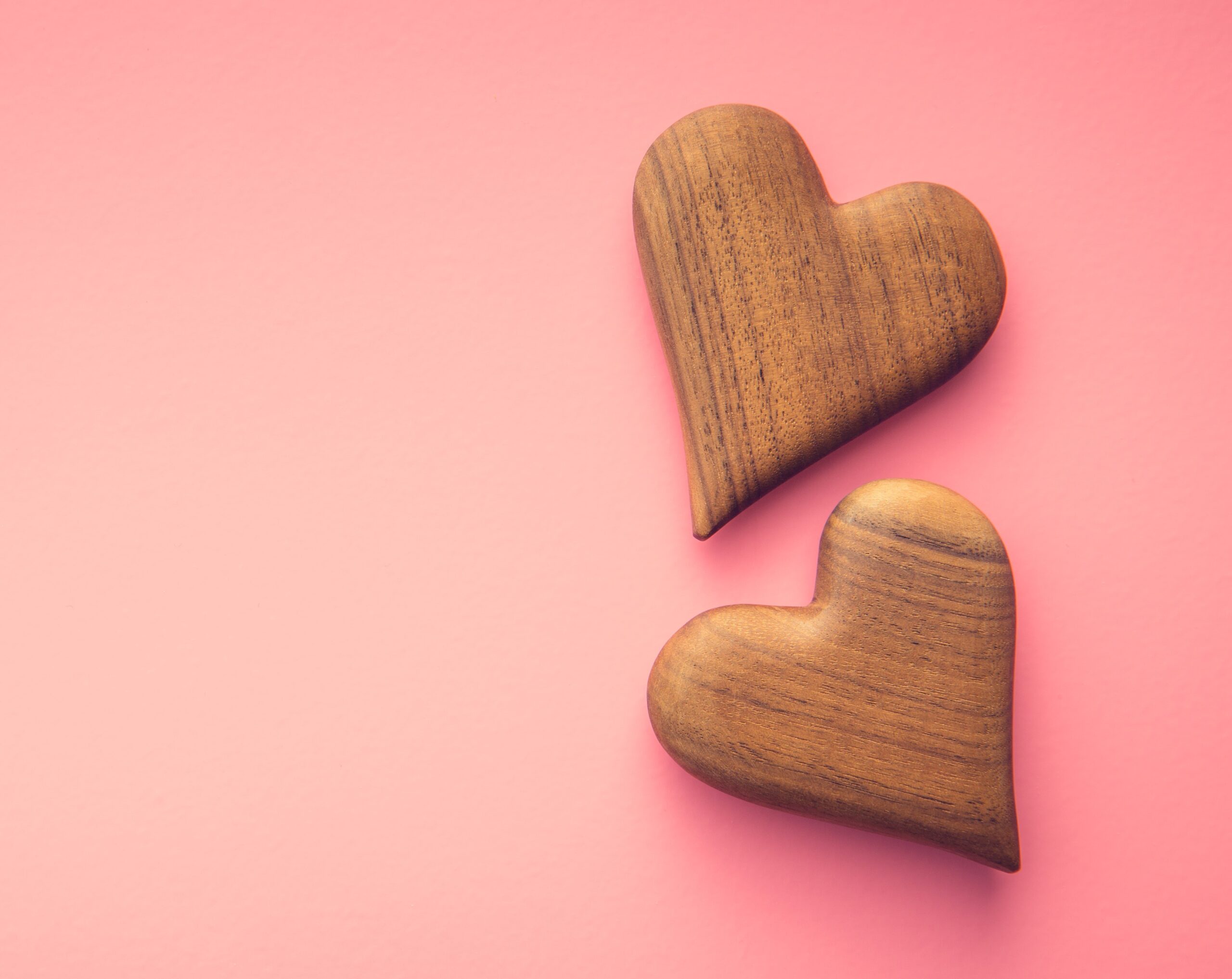 Two wooden hearts.